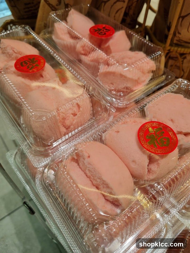 Packaged Pink Pastries with Red Stickers