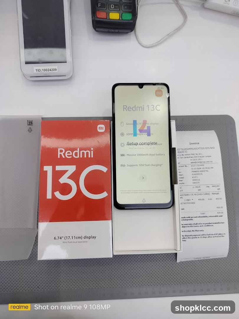 Redmi 13C Smartphone and Invoice