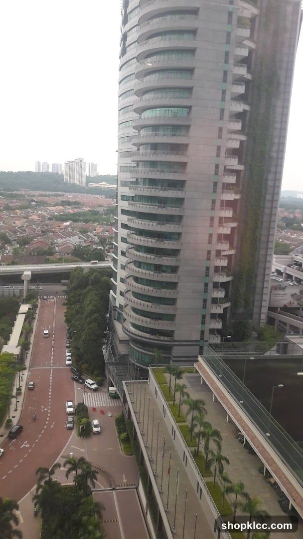 Modern Building with Greenery and City View