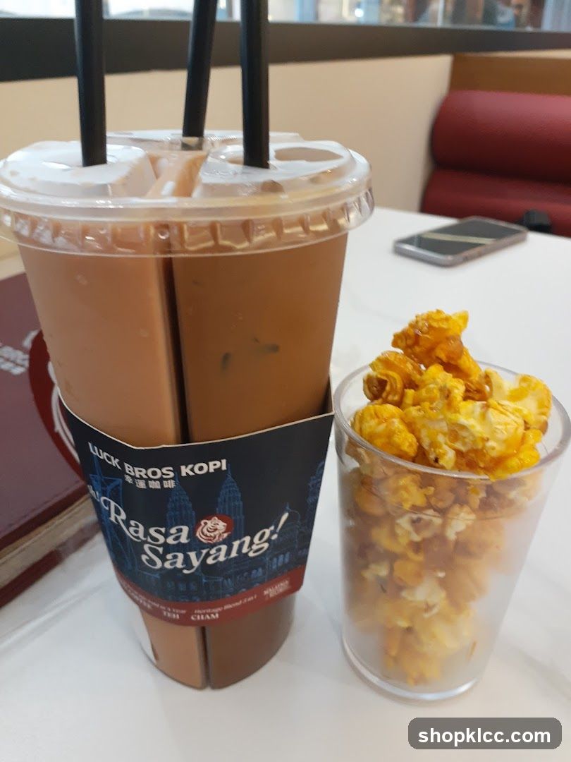 Iced Drink and Popcorn