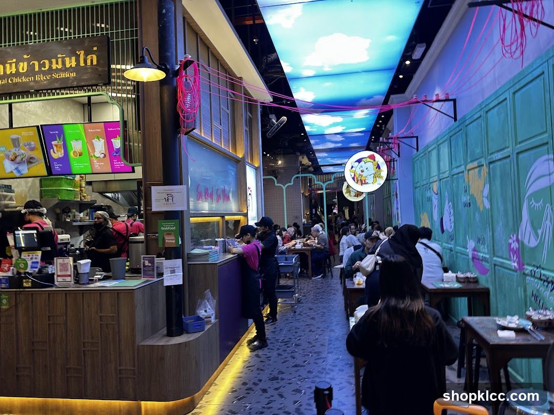 Busy Food Stall with Seating Area