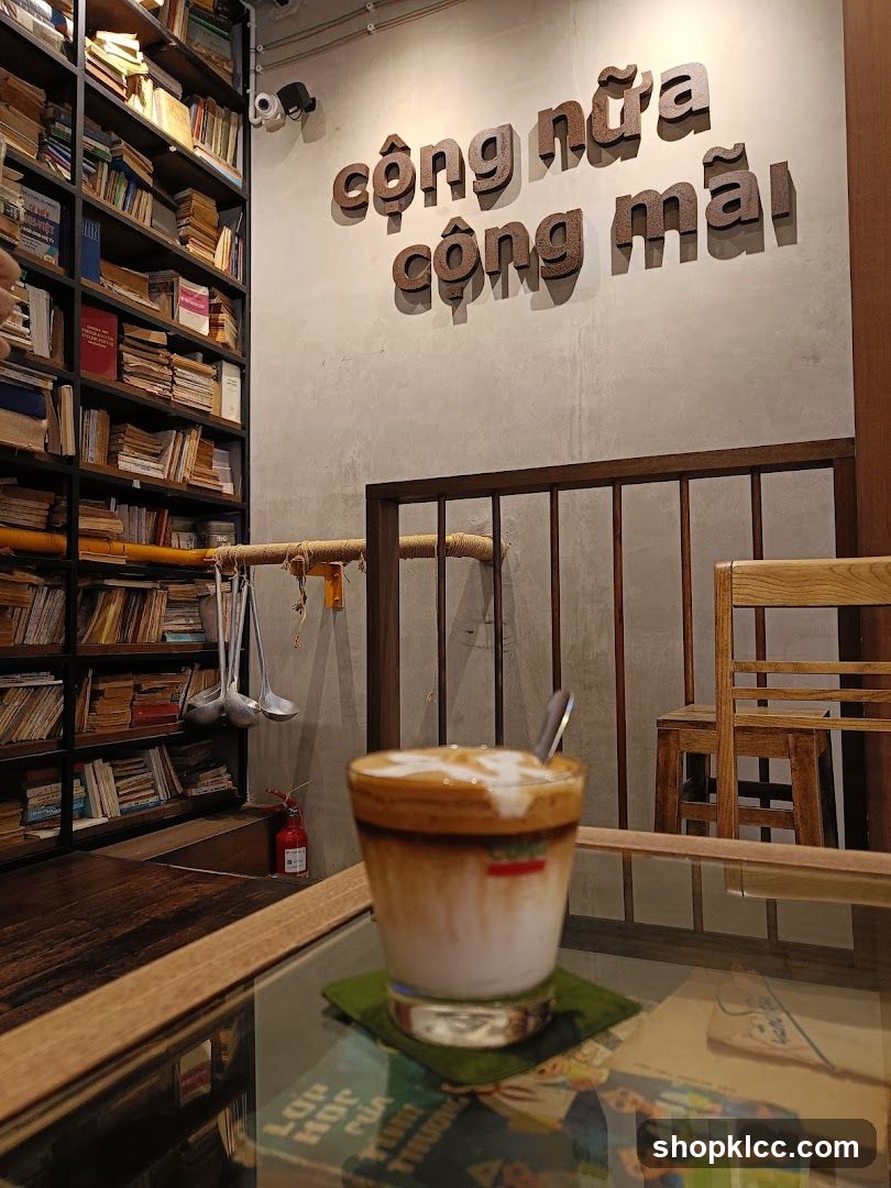 Coffee shop interior with books and drink