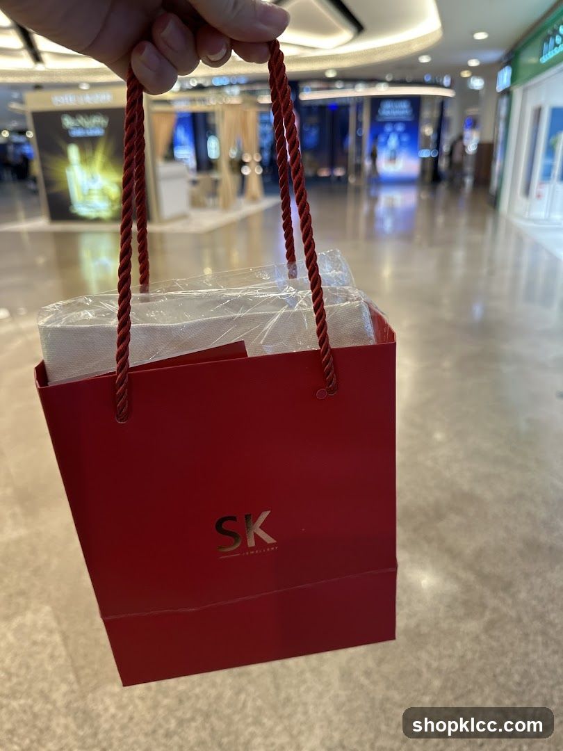 Red Shopping Bag with SK Jewellery Logo