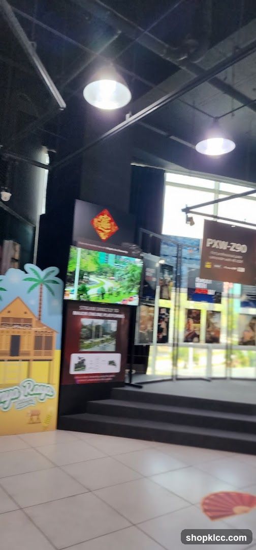 Interior Display Area with Signage and Screens