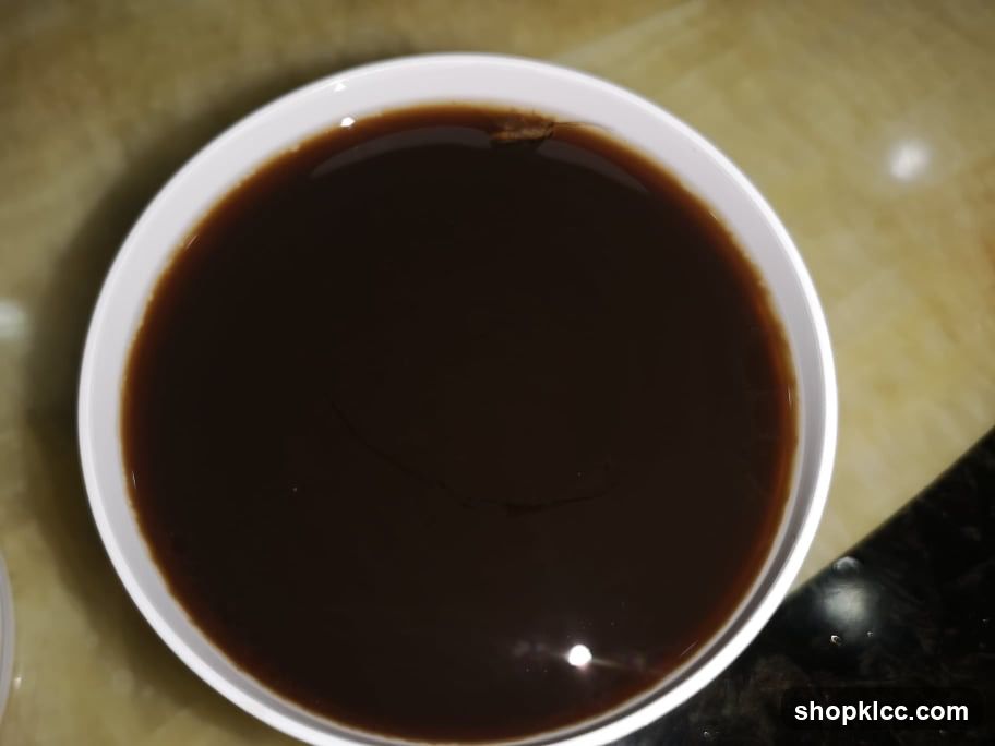Bowl of dark liquid