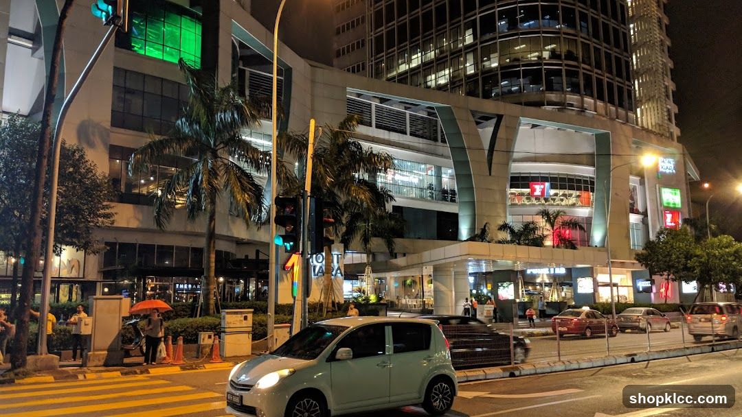 Night City Street Scene with Mall Entrance