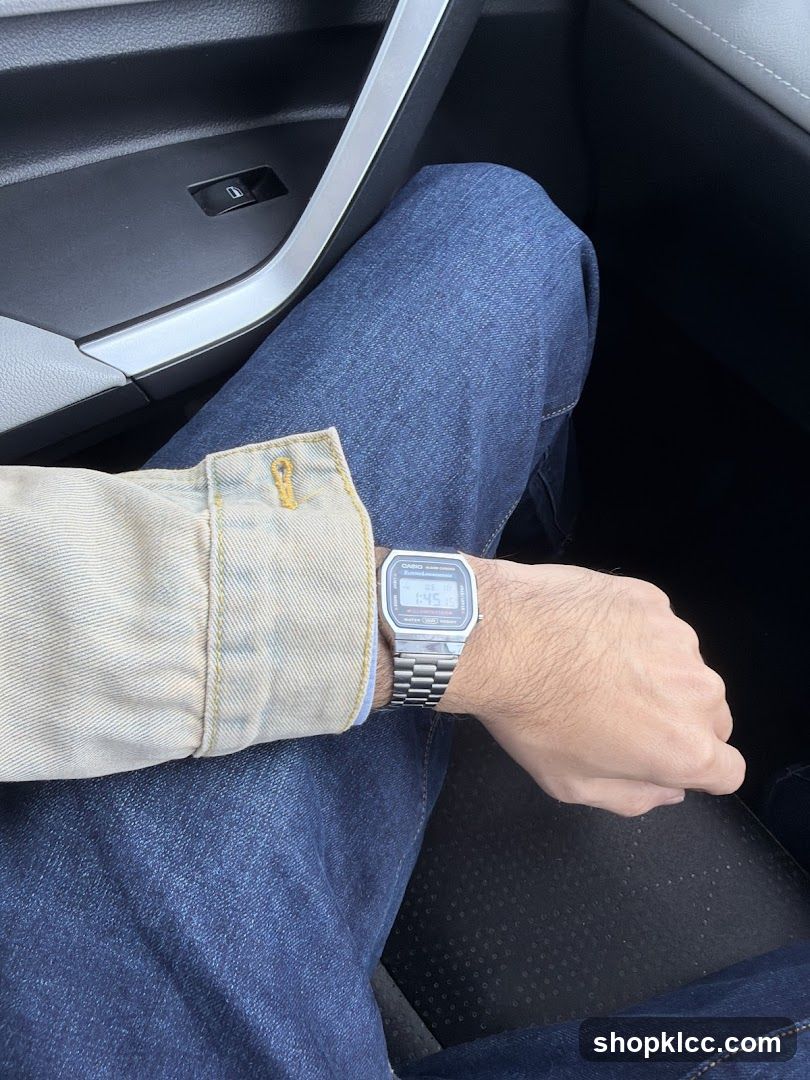 Person wearing a digital watch