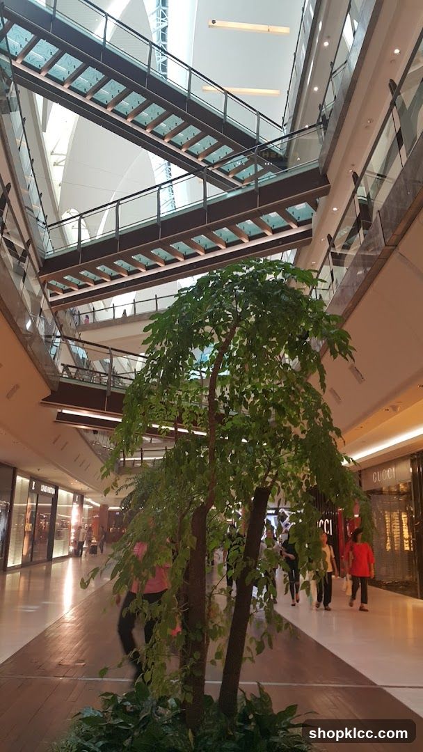 Indoor Shopping Mall with Bridges and Trees