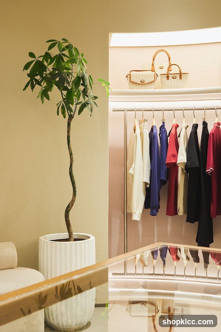 Clothing store interior with handbags and apparel