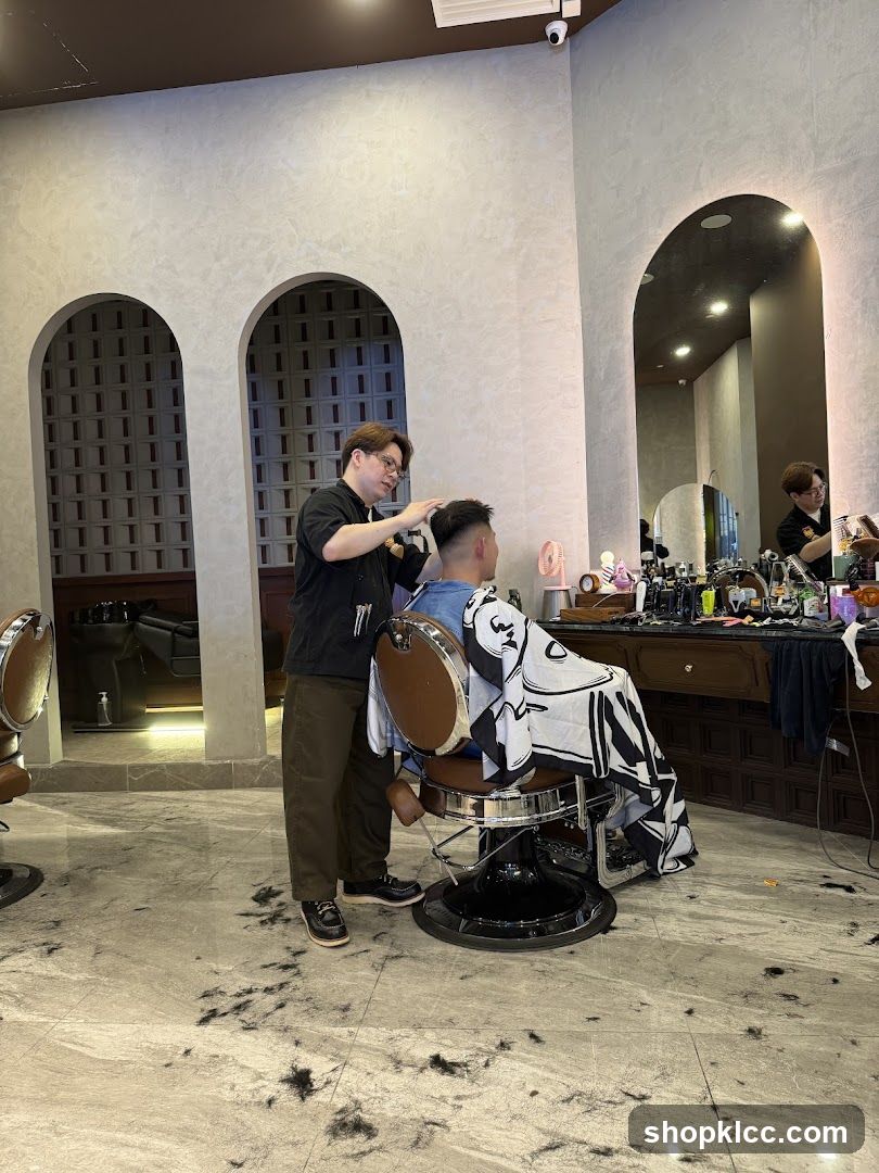 Barber cutting client's hair