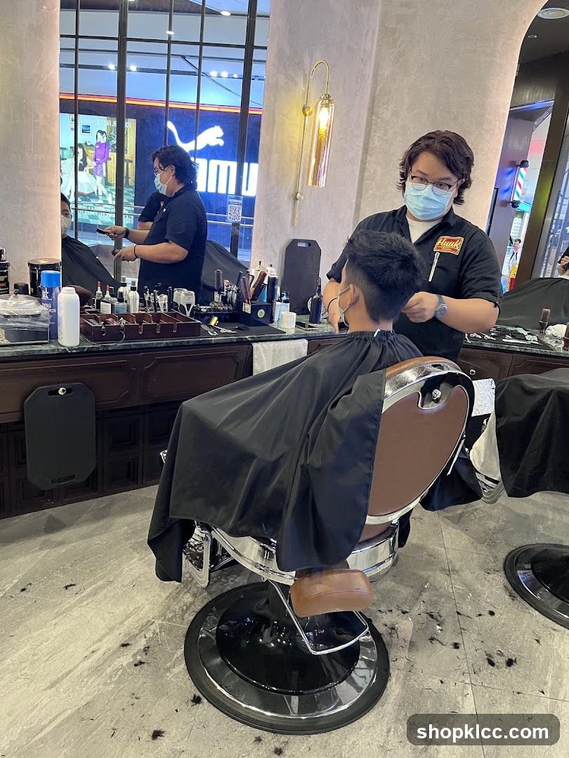 Barber cutting hair
