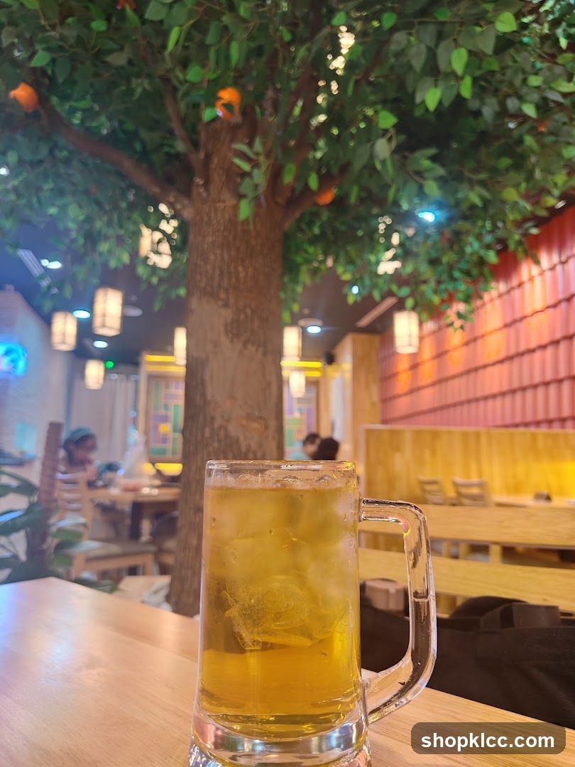 Beer in a restaurant with tree decor