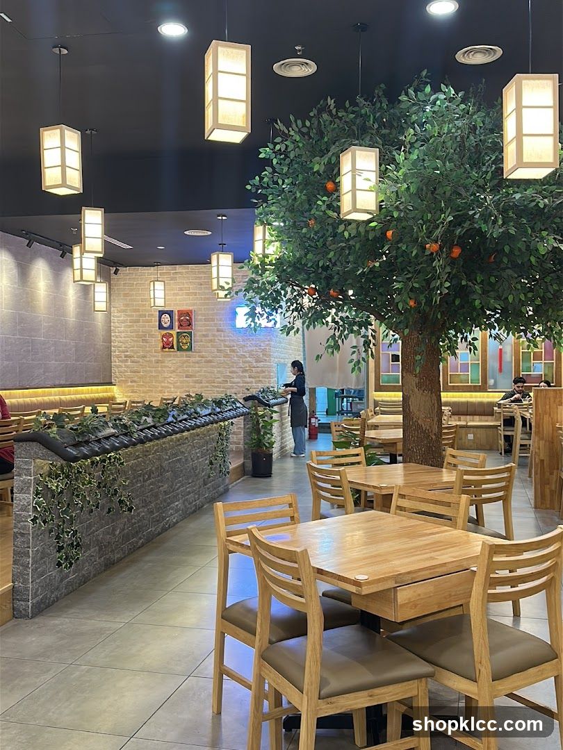 Restaurant Interior with Decorative Tree and Lighting