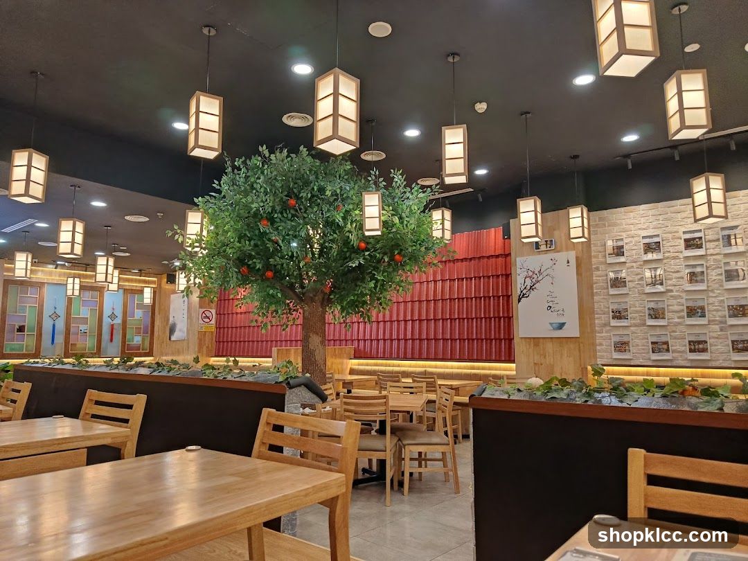 Restaurant Interior with Decorative Tree and Lighting