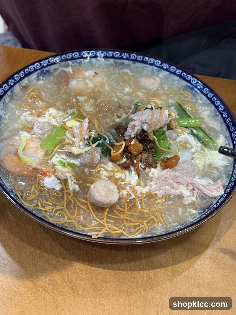 Bowl of Noodle Soup with Shrimp and Meatballs