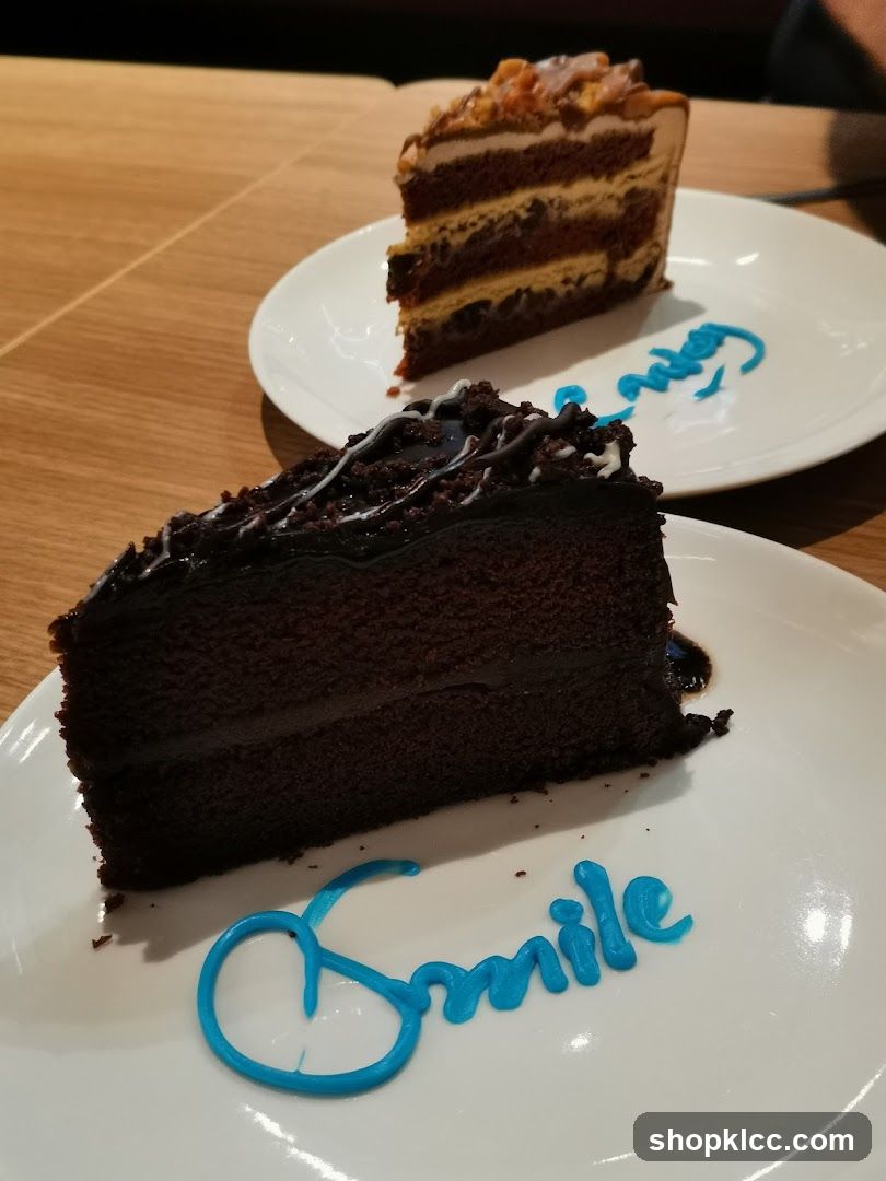 Two slices of cake on plates