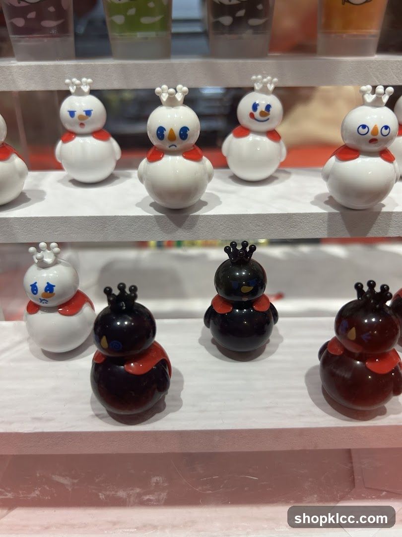 Snowman and Penguin Figurines