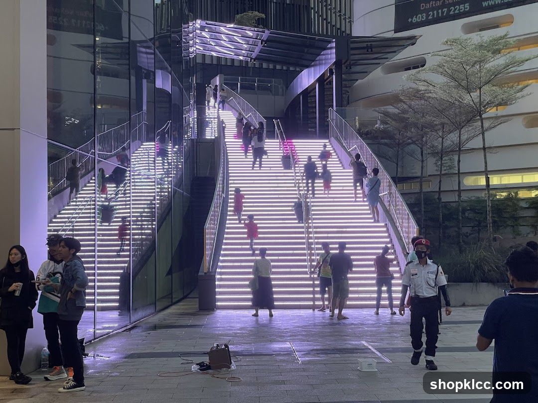 People on illuminated stairs
