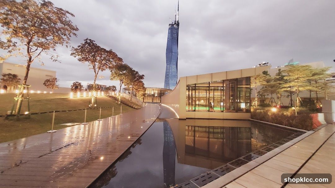 Modern Building with Reflecting Pool and Skyscraper