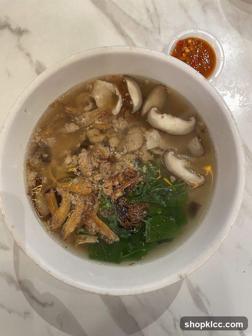 Bowl of Soup with Mushrooms and Greens