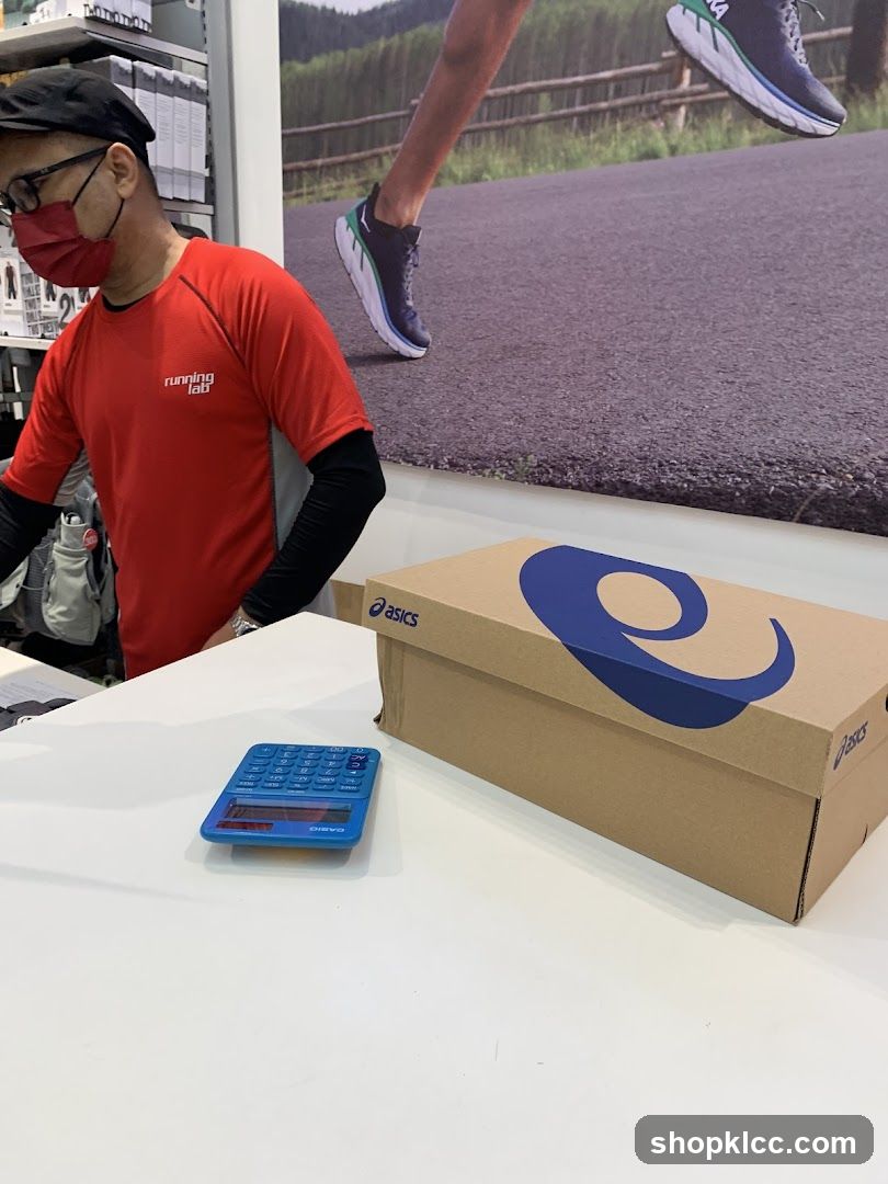 Store counter with shoe box and calculator