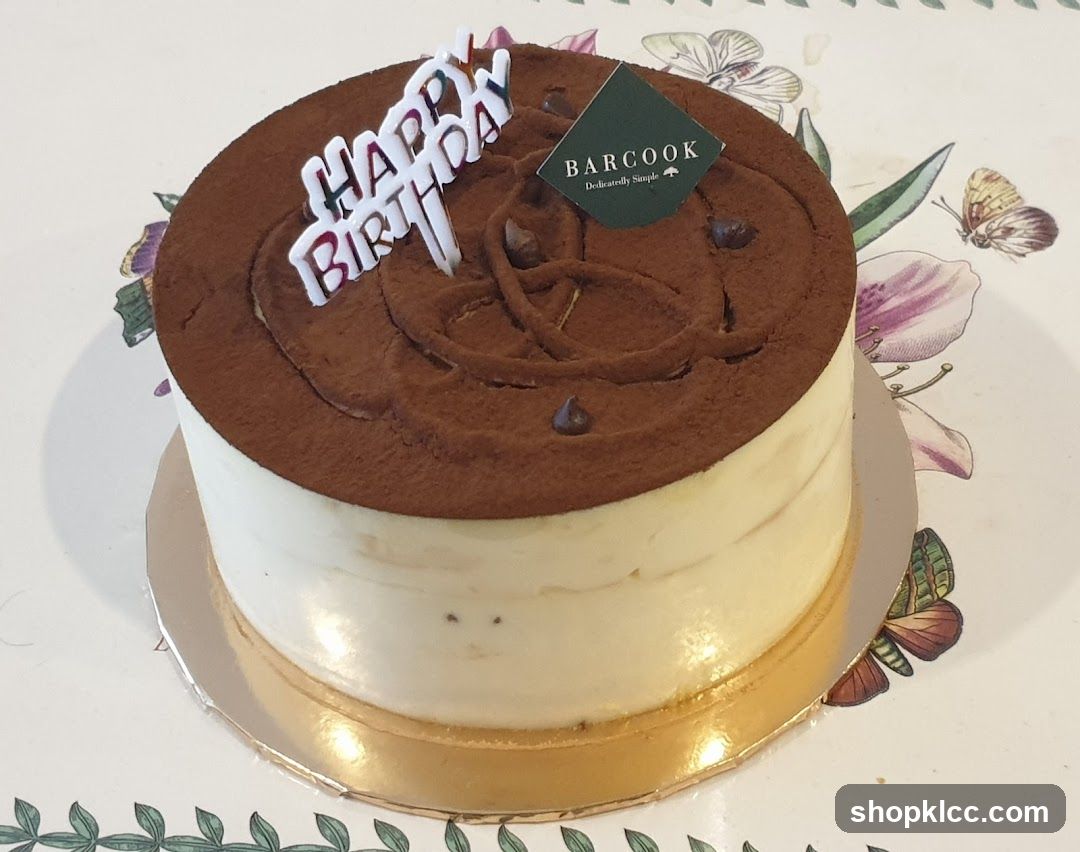 Tiramisu Cake with Happy Birthday Topper