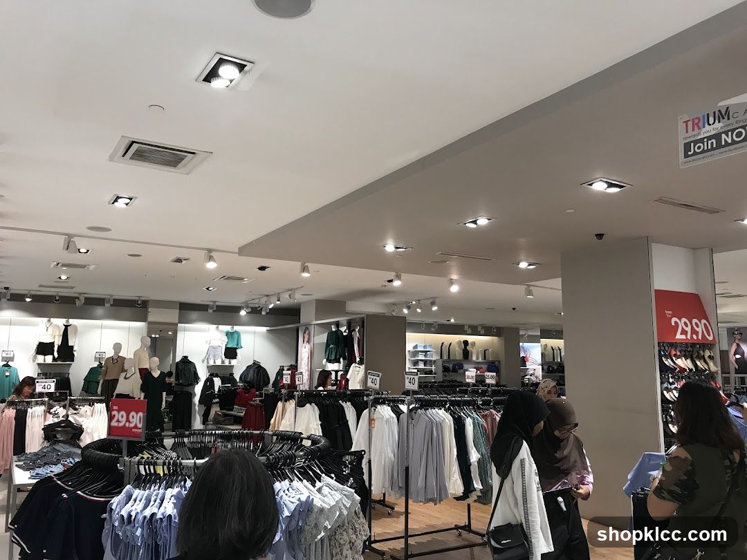 Clothing store interior with mannequins and racks of clothes