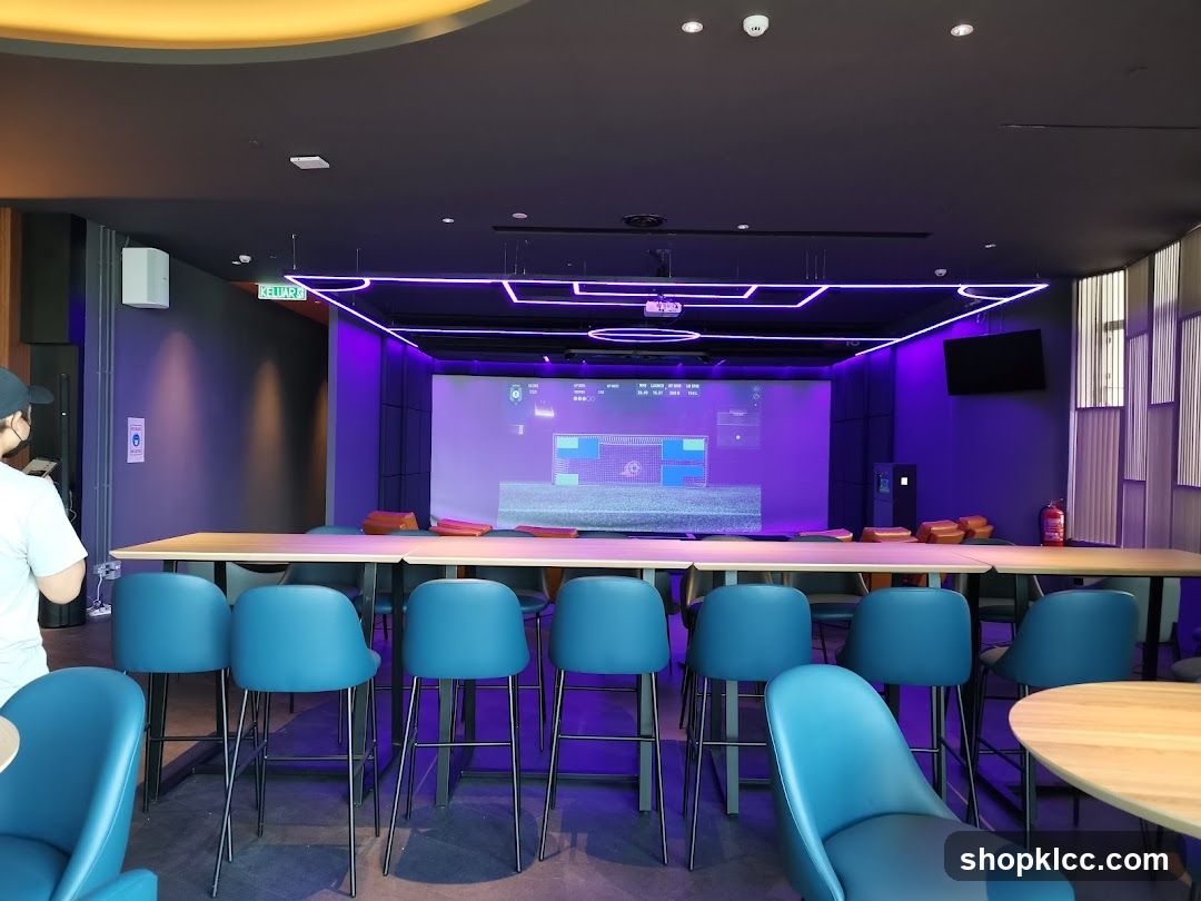 Indoor entertainment area with golf simulator