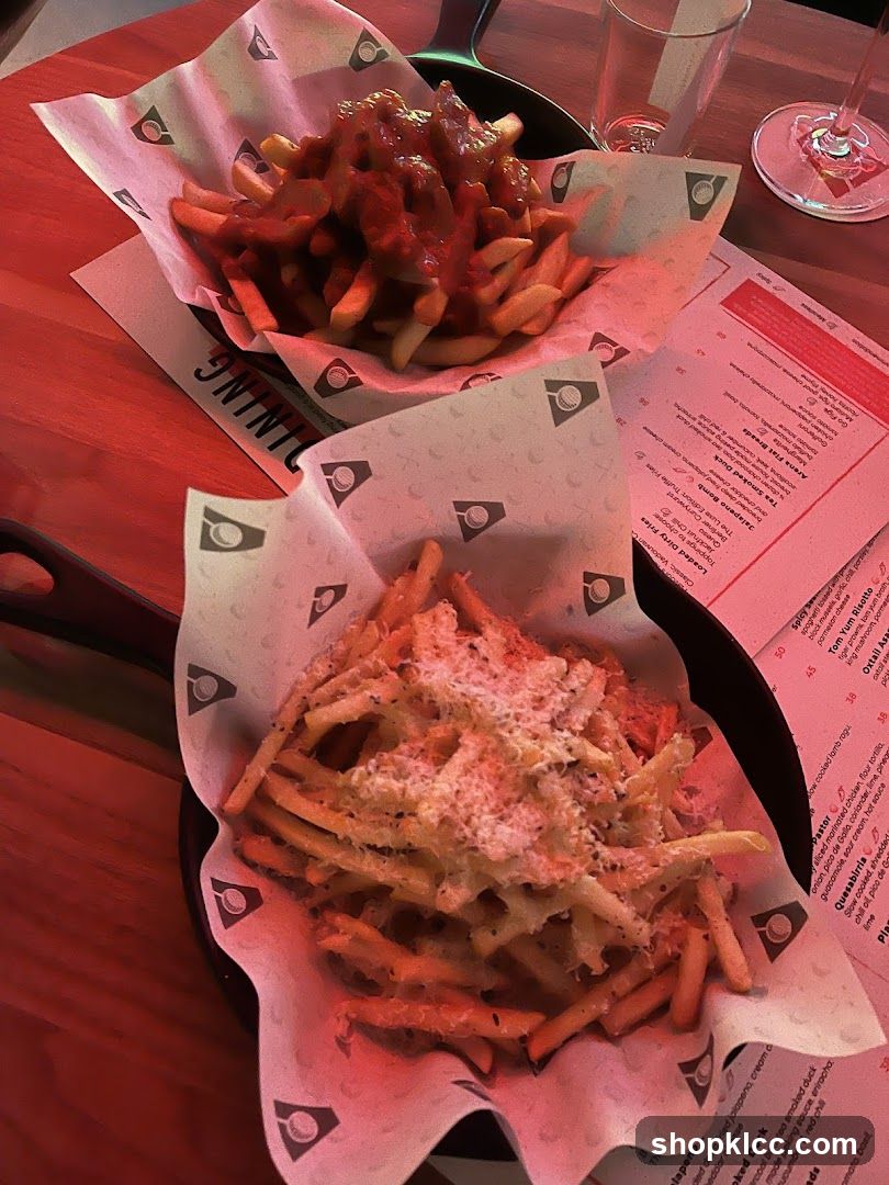 Two plates of fries