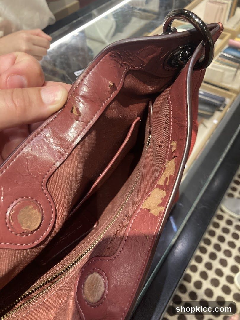Damaged Red Leather Handbag