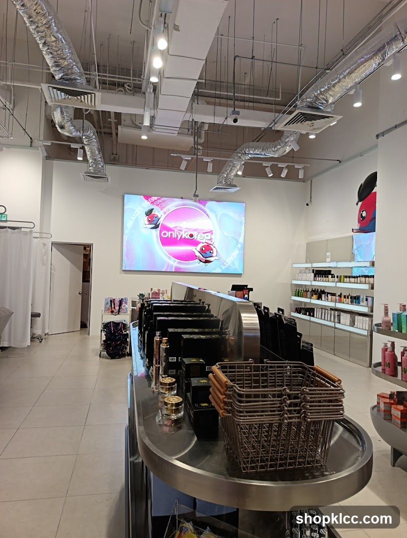 Interior of a retail store with product displays and digital signage