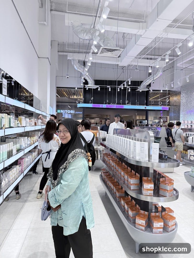 Interior of a retail store with product displays and shoppers