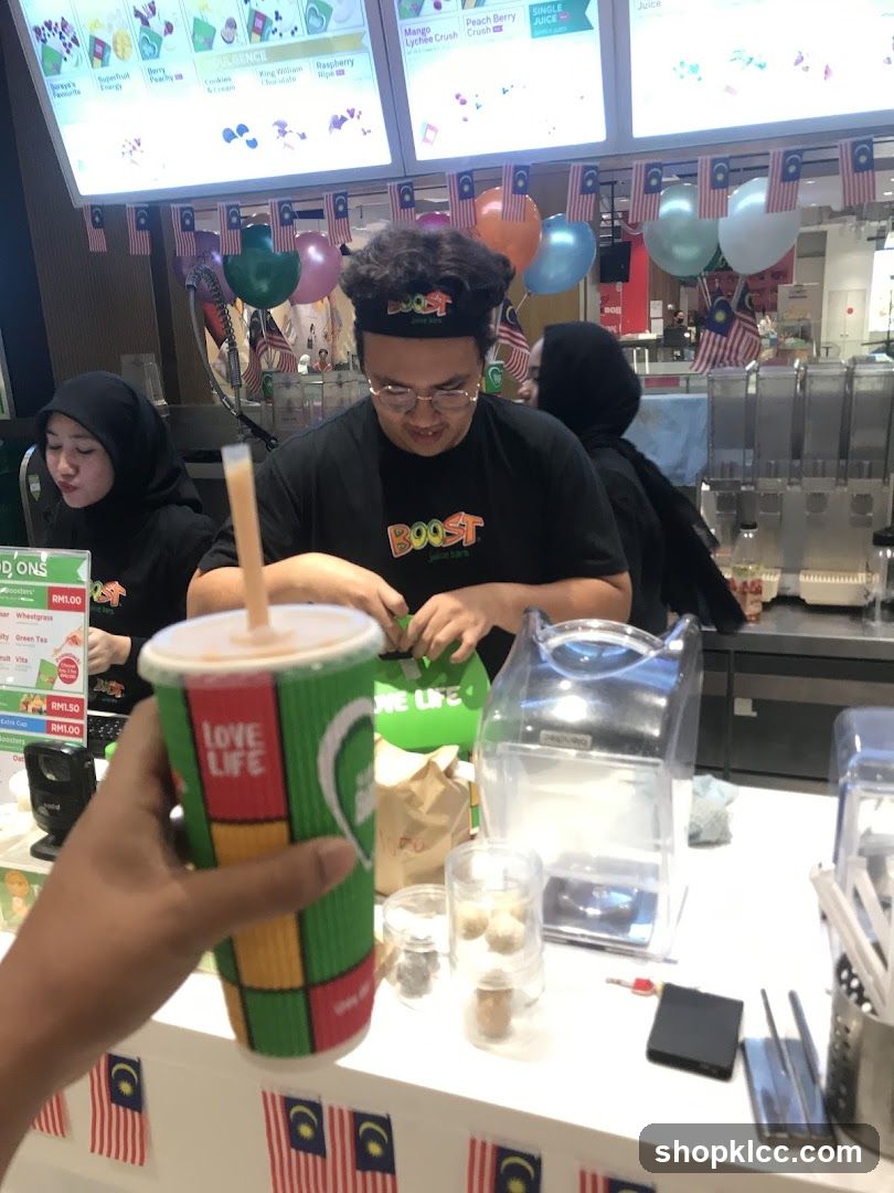 Beverage Shop Interior with Staff and Customer