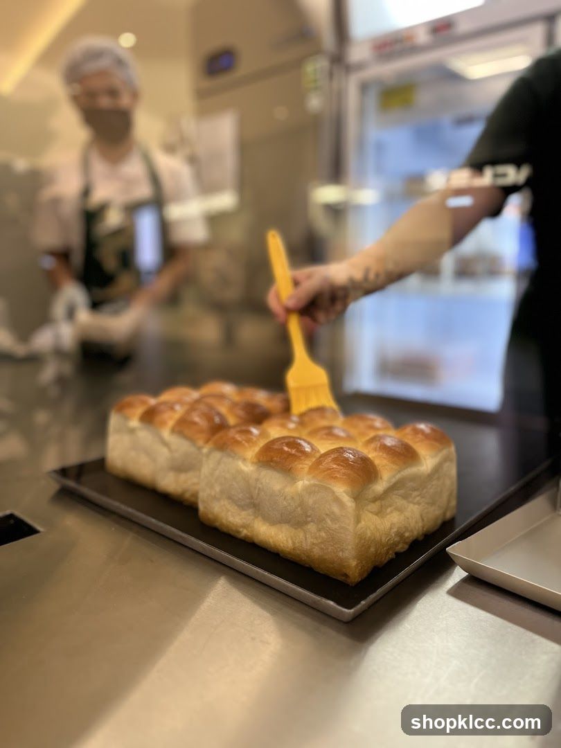 Bread Brushing in Bakery
