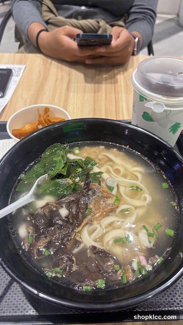 Bowl of Noodle Soup with Side Dish