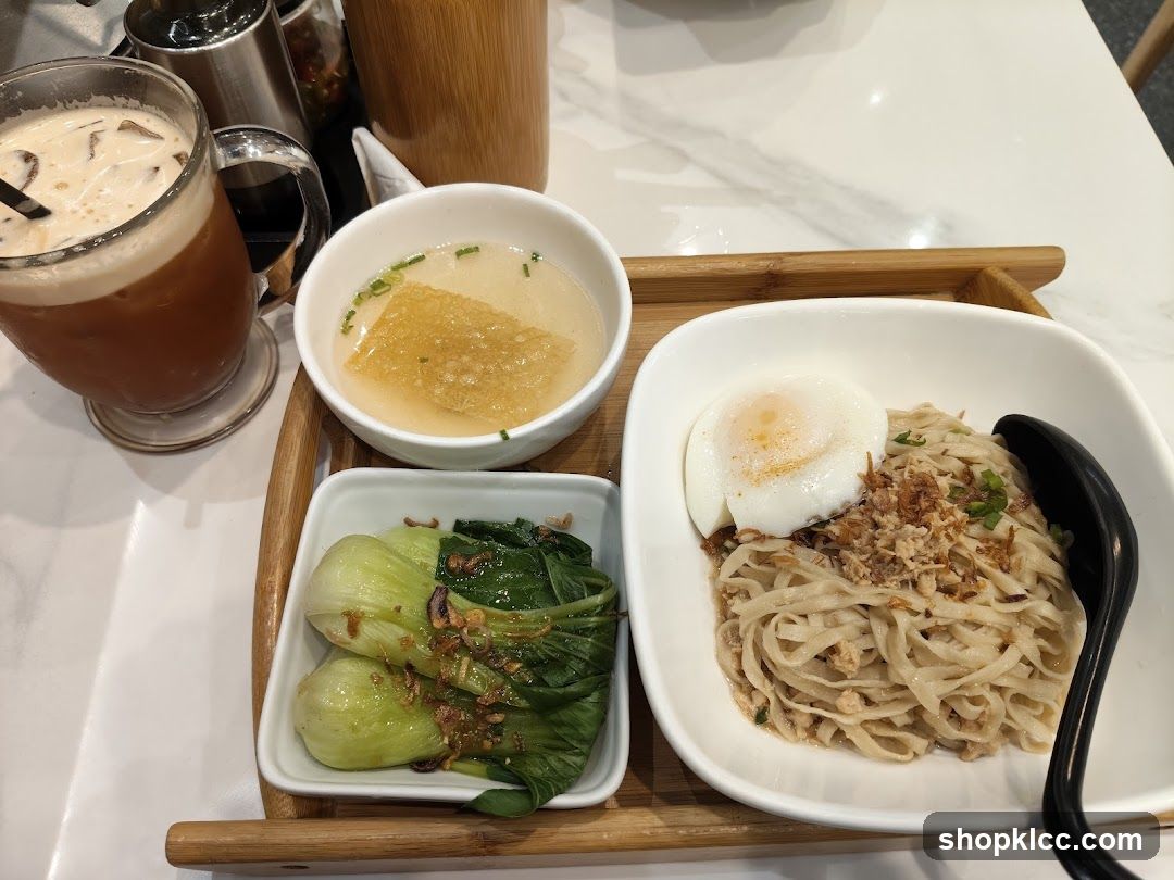 Noodle Dish with Egg and Side of Greens