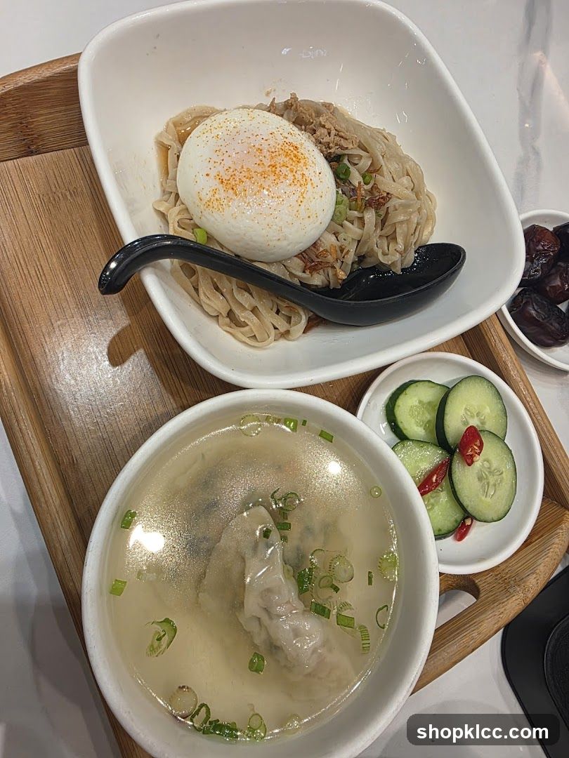 Noodle Dish with Egg and Dumpling Soup