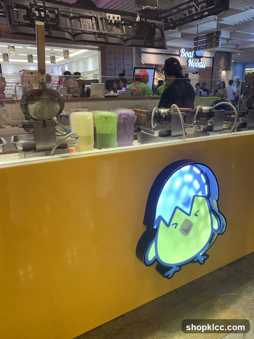 Food stall with cartoon chick logo