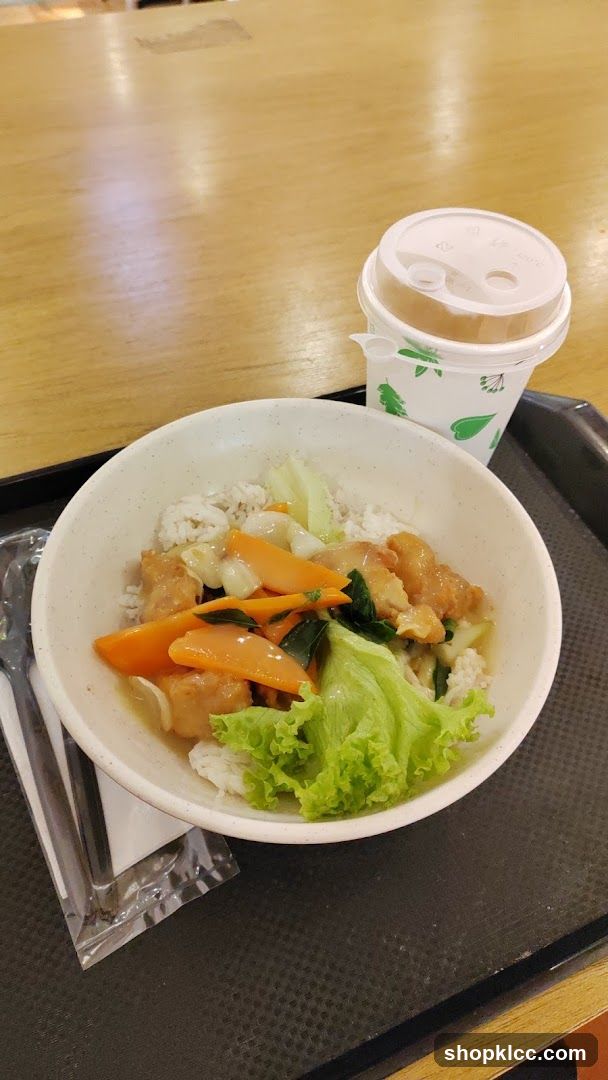 Bowl of Rice with Vegetables and Drink