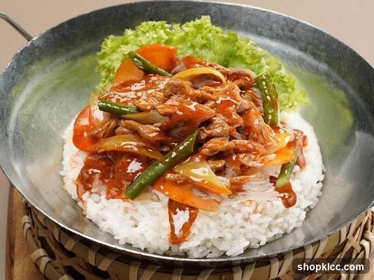Stir-fried Meat with Vegetables over Rice