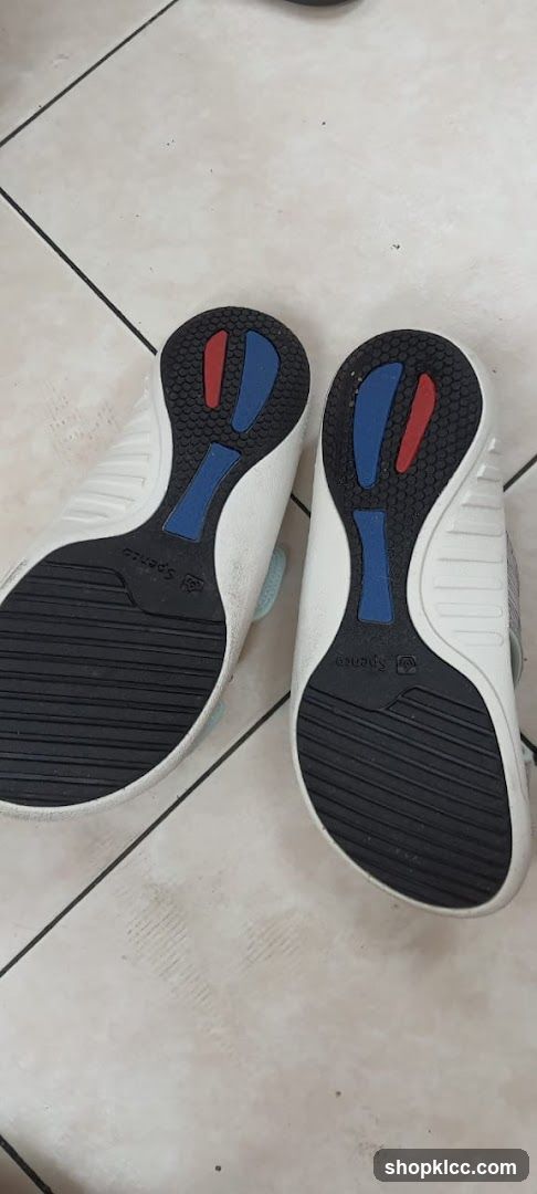 White Shoes with Red and Blue Accents