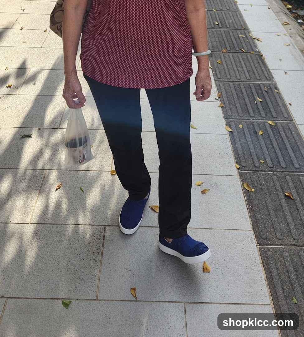 Person walking with a takeout bag