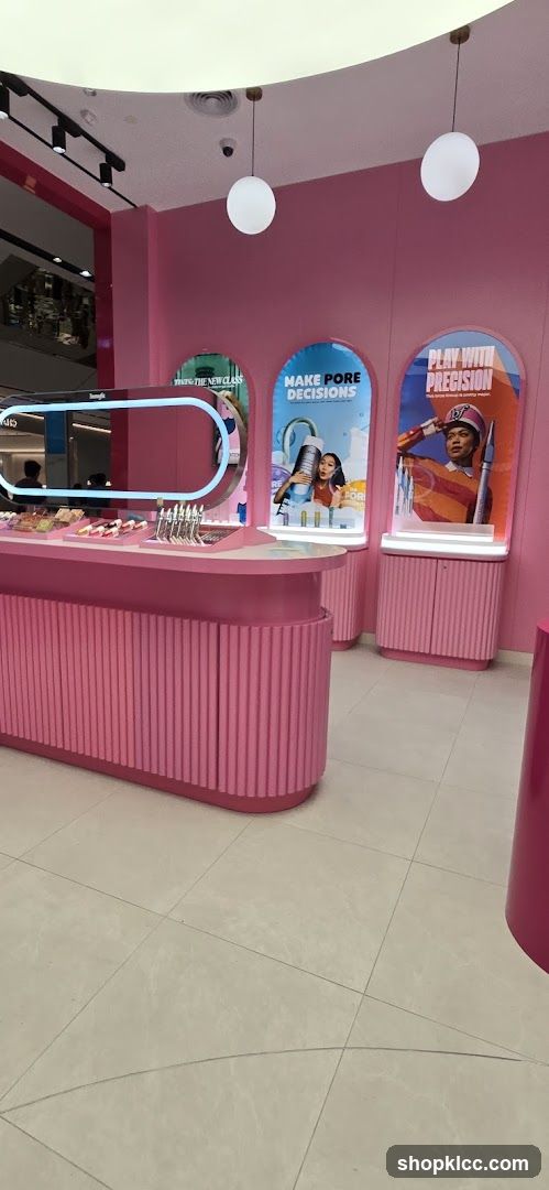 Cosmetics display with pink accents