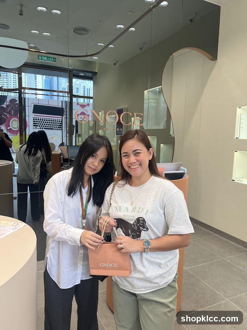 Two Women with Shopping Bag