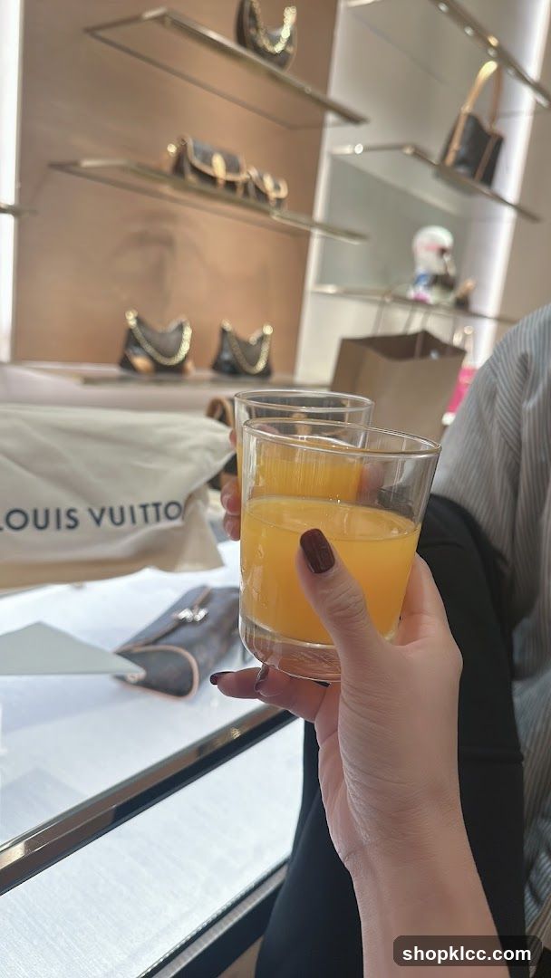 Two glasses of orange juice in a store