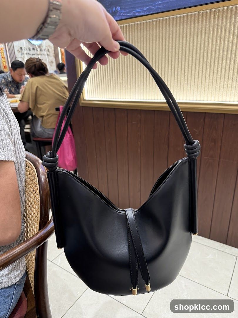 Black Handbag in Restaurant