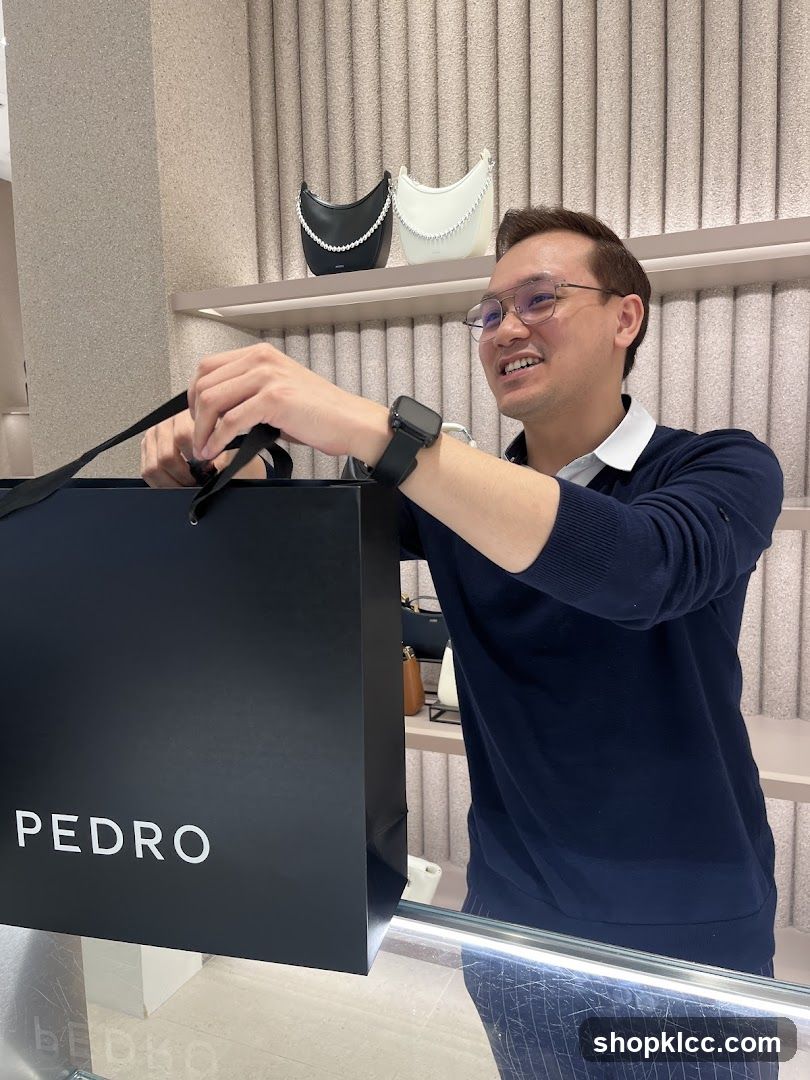 Man with Pedro Shopping Bag