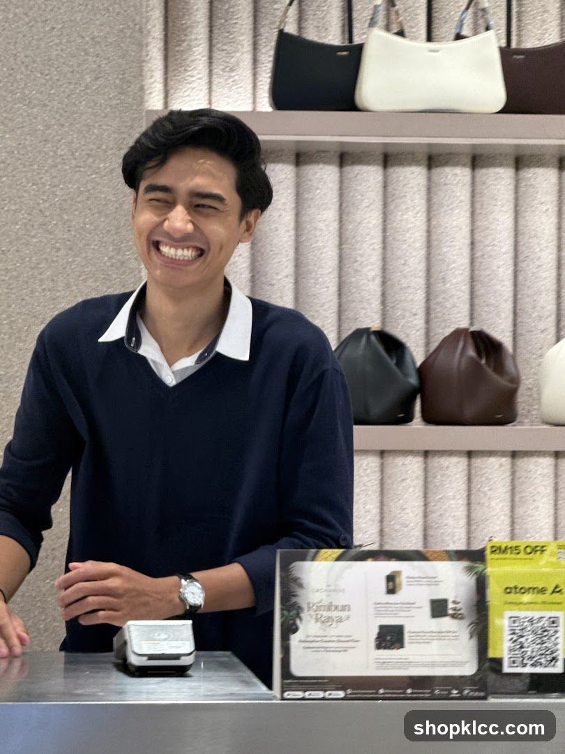 Smiling employee at a counter
