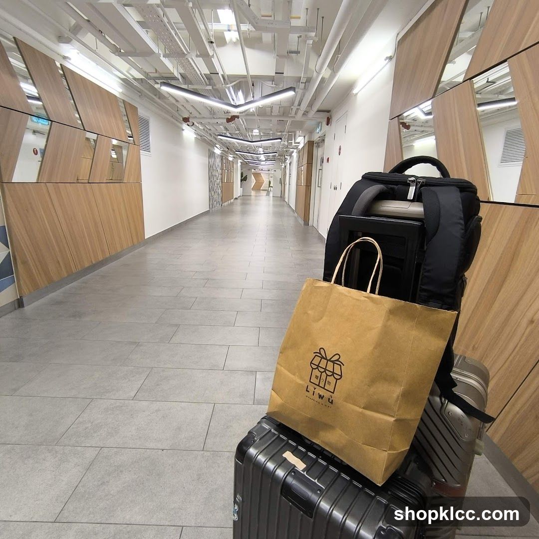 Luggage with shopping bag in hallway