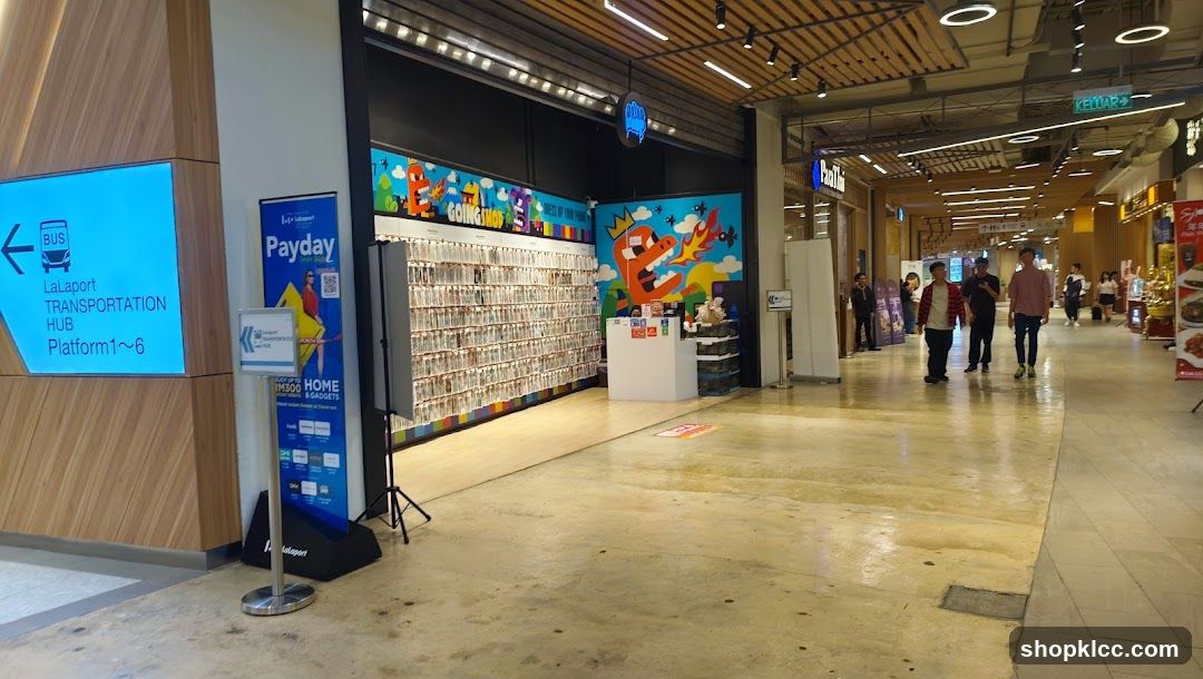 Shopping Mall Interior with Storefronts and Signage